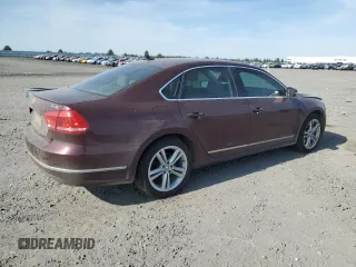2014 Volkswagen Passat SE with VIN 1VWBN7A32EC088774, listed as a Copart auction lot 60753755 with 124,660 mi miles and Salvage title. Bid and sale history available at DreamBid. Image 3.