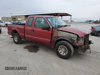 2001 Ford Super Duty F-250 XL with VIN 1FTNX20F61EB06006, listed as a Copart auction lot 84282164 with 342,531 mi miles and Salvage Title. Bid and sale history available at carsss.com. Image 4.