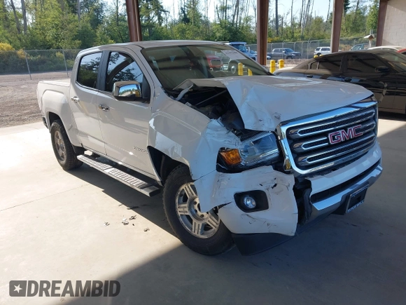 2015 GMC Canyon 2WD SLE with VIN 1GTG5CEA1F1273955, listed as a IAAI auction lot 42392908 with 79,981 mi miles and . Bid and sale history available at DreamBid. Image 1.
