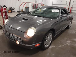 2003 Ford Thunderbird Deluxe with VIN 1FAHP60A53Y113819, listed as a IAAI auction lot 41724732 with Not Provided miles and . Bid and sale history available at DreamBid. Image 2.