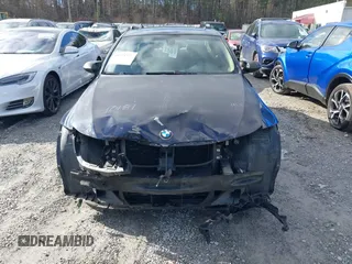 2008 BMW 3 Series 328i with VIN WBAVA37538NL52135, listed as a IAAI auction lot 41721538 with 117,121 mi miles. Bid and sale history available at carsss.com. Image 12.