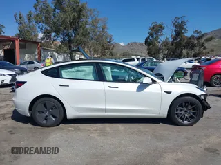 2023 Tesla Model 3 with VIN 5YJ3E1EA4PF462627, listed as a IAAI auction lot 41750103 with 38,463 mi miles and . Bid and sale history available at carsss.com. Image 13.