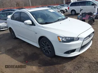 2015 Mitsubishi Lancer SE with VIN JA32V2FW9FU025402, listed as a IAAI auction lot 41646407 with 67,201 mi miles. Bid and sale history available at carsss.com. Image 1.