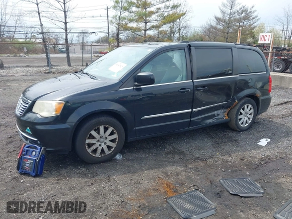 2011 Chrysler Town & Country Touring L with VIN 2A4RR8DG7BR641782, listed as a IAAI auction lot 42042025 with 141,884 mi miles and . Bid and sale history available at DreamBid. Image 2.