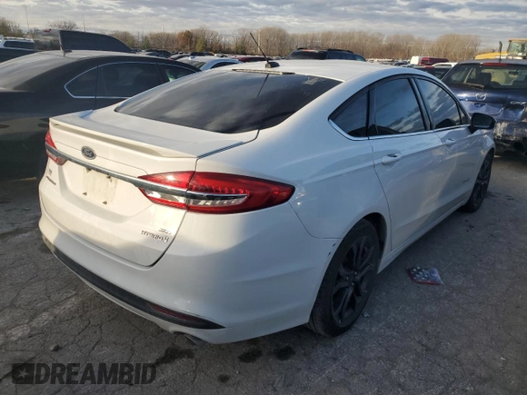 2018 Ford Fusion Hybrid SE with VIN 3FA6P0LU9JR132542, listed as a Copart auction lot 69873582 with 128,931 mi miles. Bid and sale history available at carsss.com. Image 3.