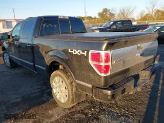 2014 Ford F-150 XL with VIN 1FTFW1ETXEFA34517, listed as a IAAI auction lot 41325436 with 163,639 mi miles. Bid and sale history available at carsss.com. Image 3.