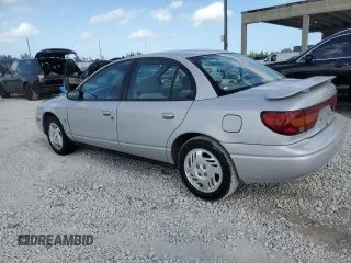 2000 Saturn SL z VIN 1G8ZK5276YZ224500, wystawiony jako Copart lot #45083945 z przebiegiem 130 766 mil mil oraz Szkoda całkowita • Salvage title. Historia ofert i sprzedaży dostępna na DreamBid. Obrazek 2.
