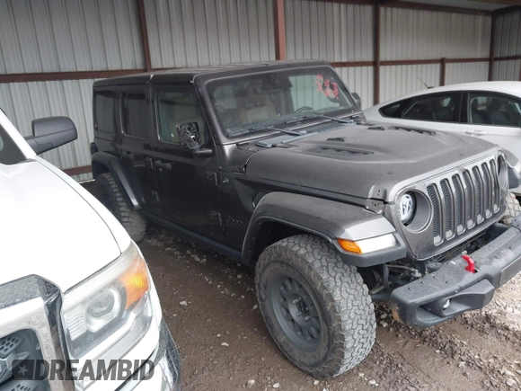 2021 Jeep Wrangler Unlimited Rubicon with VIN 1C4JJXFM6MW538774, listed as a IAAI auction lot 42368651 with 49,490 mi miles and . Bid and sale history available at DreamBid. Image 13.