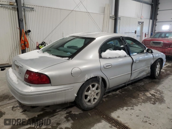 2000 Mercury Sable GS with VIN 1MEFM50U5YG601095, listed as a Copart auction lot 46221875 with 125,321 mi miles and Salvage title. Bid and sale history available at DreamBid. Image 3.