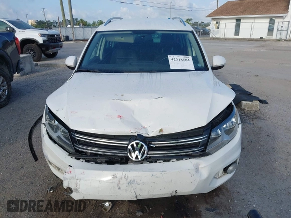 2013 Volkswagen Tiguan SE with VIN WVGAV7AX5DW545202, listed as a IAAI auction lot 42318584 with 91,556 mi miles and . Bid and sale history available at DreamBid. Image 6.