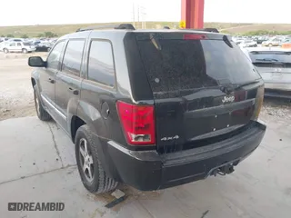 2005 Jeep Grand Cherokee Laredo with VIN 1J4HR48N75C647740, listed as a IAAI auction lot 41803160 with 145,147 mi miles. Bid and sale history available at carsss.com. Image 3.