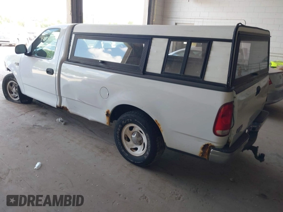 2004 Ford F-150 XL with VIN 2FTRF17214CA28696, listed as a IAAI auction lot 42246526 with 132,403 mi miles and . Bid and sale history available at DreamBid. Image 3.