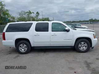 2014 Chevrolet Suburban LT with VIN 1GNSCJE06ER231476, listed as a IAAI auction lot 41768616 with 88,581 mi miles. Bid and sale history available at carsss.com. Image 13.