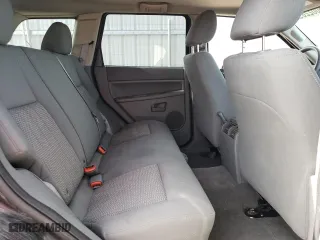 2007 Jeep Grand Cherokee Laredo with VIN 1J8HR48P67C698021, listed as a Copart auction lot 50022895 with 176,120 mi miles and Salvage Title. Bid and sale history available at carsss.com. Image 11.