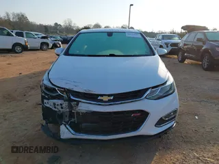 2017 Chevrolet Cruze LT z VIN 1G1BE5SM0H7235078, wystawiony jako IAAI lot #41734625 z przebiegiem 140 548 mil mil oraz . Historia ofert i sprzedaży dostępna na DreamBid. Obrazek 12.