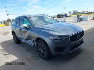 2018 Volvo XC60 R-Design z VIN YV4BR0DM1J1012856, wystawiony jako IAAI lot #42019398 z przebiegiem 76 321 mil mil oraz . Historia ofert i sprzedaży dostępna na DreamBid. Obrazek 1.