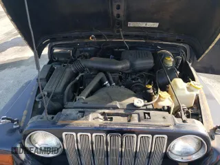 1997 Jeep Wrangler SE z VIN 1J4FY29PXVP464548, wystawiony jako Copart lot #59430535 z przebiegiem 183 412 mil mil oraz Czysty tytuł • Clean title. Historia ofert i sprzedaży dostępna na DreamBid. Obrazek 11.