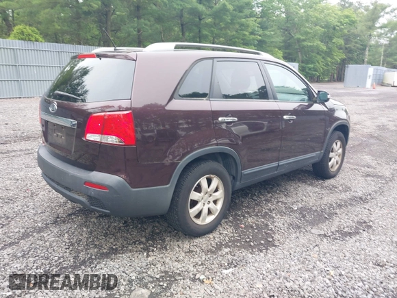 2011 Kia Sorento LX with VIN 5XYKT3A1XBG147240, listed as a IAAI auction lot 42465947 with 112,150 mi miles and . Bid and sale history available at DreamBid. Image 4.