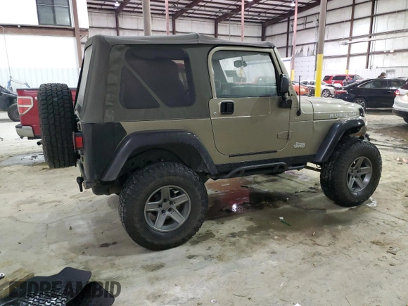 2003 Jeep Wrangler Rubicon z VIN 1J4FA69S13P345591, wystawiony jako Copart lot #41741685 z przebiegiem 85 335 mil mil oraz Szkoda całkowita • Salvage title. Historia ofert i sprzedaży dostępna na DreamBid. Obrazek 3.
