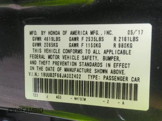 2018 Acura TLX w/A-SPEC Pkg with VIN 19UUB2F66JA002402, listed as a IAAI auction lot 41960832 with 91,643 mi miles. Bid and sale history available at carsss.com. Image 9.