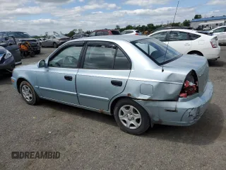 2004 Hyundai Accent GL z VIN KMHCG45C94U574027, wystawiony jako Copart lot #57463905 z przebiegiem 139 595 mil mil oraz Szkoda całkowita • Salvage title. Historia ofert i sprzedaży dostępna na DreamBid. Obrazek 2.