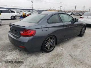 2016 BMW 2 Series M235i with VIN WBA1J7C52GV359572, listed as a Copart auction lot 38942884 with 65,456 mi miles. Bid and sale history available at carsss.com. Image 3.