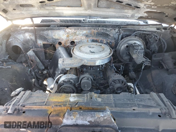 1989 Chevrolet Suburban z VIN 1GNGV26K8KF128711, wystawiony jako Copart lot #46658895 z przebiegiem Nie podano mil oraz Szkoda całkowita • Salvage title. Historia ofert i sprzedaży dostępna na DreamBid. Obrazek 13.