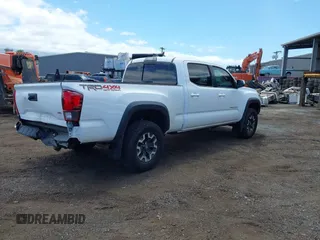2018 Toyota Tacoma SR5 with VIN 3TMDZ5BN5JM048038, listed as a IAAI auction lot 42084922 with 79,718 mi miles and . Bid and sale history available at DreamBid. Image 4.