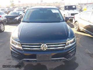 2021 Volkswagen Tiguan S with VIN 3VV1B7AX2MM051166, listed as a IAAI auction lot 41233878 with 28,690 mi miles. Bid and sale history available at carsss.com. Image 12.