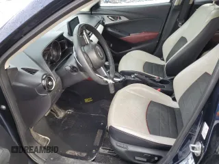 2018 Mazda CX-3 Grand Touring z VIN JM1DKFD73J0309811, wystawiony jako Copart lot #50003315 z przebiegiem 135 365 mil mil oraz Czysty tytuł • Clean title. Historia ofert i sprzedaży dostępna na DreamBid. Obrazek 7.