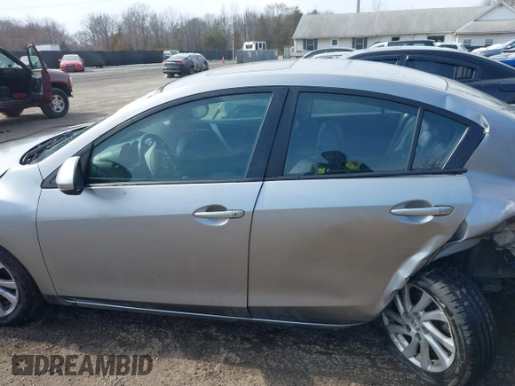 2012 Mazda 3 i Grand Touring with VIN JM1BL1W86C1688281, listed as a IAAI auction lot 41643298 with 266,291 mi miles and . Bid and sale history available at DreamBid. Image 13.