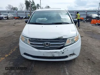 2011 Honda Odyssey EX-L with VIN 5FNRL5H67BB070541, listed as a IAAI auction lot 41812554 with 150,898 mi miles and . Bid and sale history available at DreamBid. Image 6.