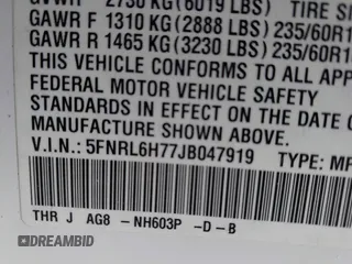 2018 Honda Odyssey EX-L with VIN 5FNRL6H77JB047919, listed as a IAAI auction lot 42112505 with 108,706 mi miles and . Bid and sale history available at DreamBid. Image 9.