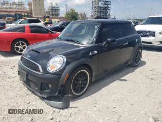 2011 MINI Hardtop S with VIN WMWSV3C53BTY15603, listed as a Copart auction lot 54893395 with 104,206 mi miles and Salvage title. Bid and sale history available at DreamBid. Image 1.