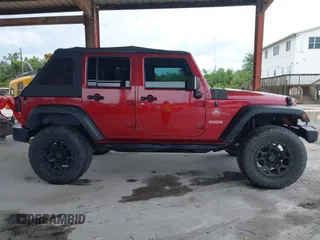2012 Jeep Wrangler Unlimited Sport z VIN 1C4BJWDG3CL207291, wystawiony jako IAAI lot #42211454 z przebiegiem 110 864 mil mil oraz . Historia ofert i sprzedaży dostępna na DreamBid. Obrazek 14.