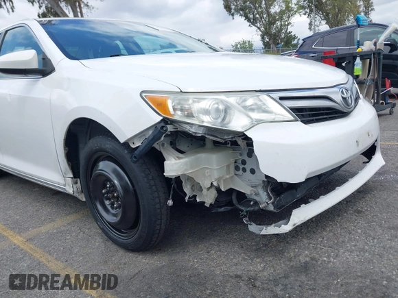 2014 Toyota Camry L with VIN 4T1BF1FK4EU403013, listed as a IAAI auction lot 42115089 with 221,686 mi miles and . Bid and sale history available at DreamBid. Image 6.