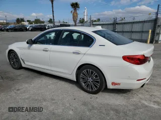 2018 BMW 5 Series 530e with VIN WBAJA9C52JB249643, listed as a Copart auction lot 43581825 with 91,561 mi miles and Salvage title. Bid and sale history available at DreamBid. Image 2.