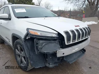 2016 Jeep Cherokee Latitude with VIN 1C4PJMCB7GW268714, listed as a IAAI auction lot 41655450 with 180,603 mi miles. Bid and sale history available at carsss.com. Image 19.