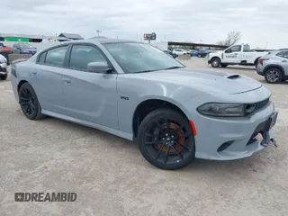2021 Dodge Charger Scat Pack with VIN 2C3CDXGJ2MH535748, listed as a IAAI auction lot 41400534 with 48,424 mi miles and . Bid and sale history available at DreamBid. Image 1.