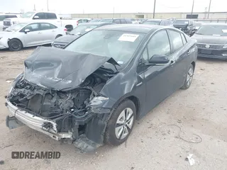 2017 Toyota Prius Two with VIN JTDKBRFU2H3052287, listed as a IAAI auction lot 41507689 with 82,205 mi miles and . Bid and sale history available at carsss.com. Image 2.