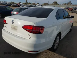2016 Volkswagen Jetta Sedan 1.4T SE with VIN 3VWD67AJXGM365869, listed as a IAAI auction lot 41261109 with 59,325 mi miles. Bid and sale history available at carsss.com. Image 4.
