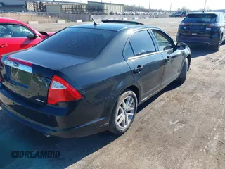 2012 Ford Fusion SEL z VIN 3FAHP0JG2CR338469, wystawiony jako IAAI lot #42095378 z przebiegiem 180 762 mil mil oraz . Historia ofert i sprzedaży dostępna na DreamBid. Obrazek 4.