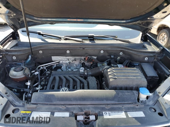 2018 Volkswagen Atlas SEL Premium z VIN 1V2NR2CA6JC577688, wystawiony jako Copart lot #60800465 z przebiegiem 82 841 mil mil oraz Szkoda całkowita • Salvage title. Historia ofert i sprzedaży dostępna na DreamBid. Obrazek 12.