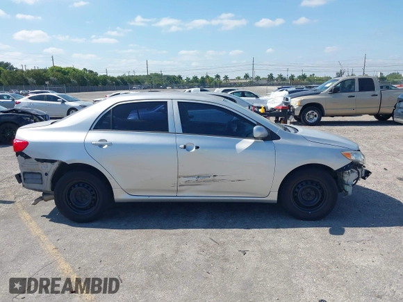 2010 Toyota Corolla with VIN 1NXBU4EE2AZ240438, listed as a IAAI auction lot 42125407 with 185,253 mi miles and . Bid and sale history available at DreamBid. Image 14.