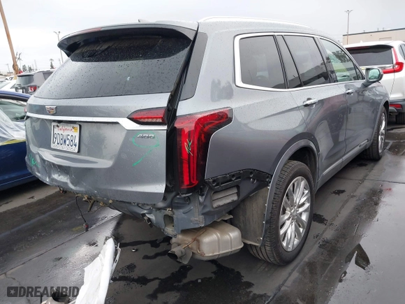 2020 Cadillac XT6 FWD Premium Luxury with VIN 1GYKPCRSXLZ105231, listed as a IAAI auction lot 41735556 with 70,319 mi miles. Bid and sale history available at carsss.com. Image 4.