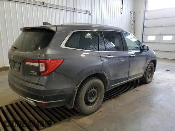 2019 Honda Pilot Touring 8-Passenger z VIN 5FNYF6H93KB502528, wystawiony jako Copart lot #51811045 z przebiegiem 157 204 mil mil oraz Czysty tytuł • Clean title. Historia ofert i sprzedaży dostępna na DreamBid. Obrazek 3.