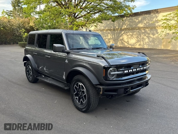 2022 Ford Bronco with VIN 1FMEE5DP5NLB24049, listed as a Copart auction lot 56769875 with 20,710 mi miles and Salvage Title. Bid and sale history available at DreamBid. Image 1.