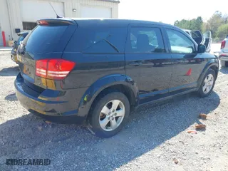 2013 Dodge Journey SE with VIN 3C4PDCAB3DT529696, listed as a IAAI auction lot 41885319 with 130,947 mi miles. Bid and sale history available at carsss.com. Image 4.