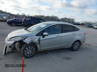 2015 Ford Fiesta SE z VIN 3FADP4BJ1FM220222, wystawiony jako IAAI lot #41209318 z przebiegiem 113 134 mil mil oraz . Historia ofert i sprzedaży dostępna na DreamBid. Obrazek 14.