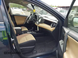 2018 Toyota RAV4 XLE with VIN JTMWFREV9JJ165655, listed as a IAAI auction lot 42138998 with 123,569 mi miles and . Bid and sale history available at carsss.com. Image 5.
